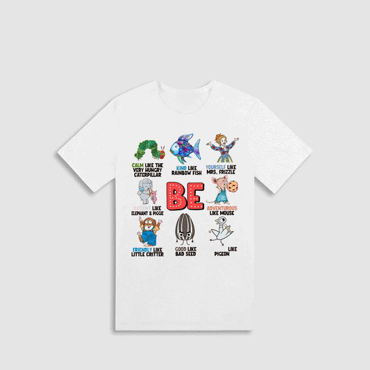 The image is a white t-shirt with a graphic design featuring various cartoon characters and text related to the word "BE".