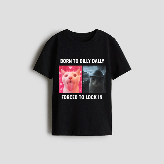 The image is a black t-shirt with a graphic design featuring two cat images and text that reads "Born to Dilly Dally forced to lock in".