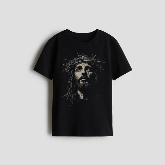 A black t-shirt with a monochromatic image of Jesus Christ wearing a crown of thorns.