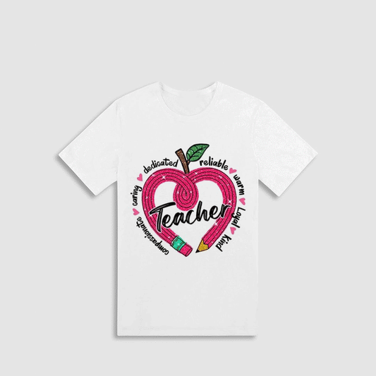 A white t-shirt with a graphic design featuring an apple with a heart shape and the word "Teacher" written inside it.