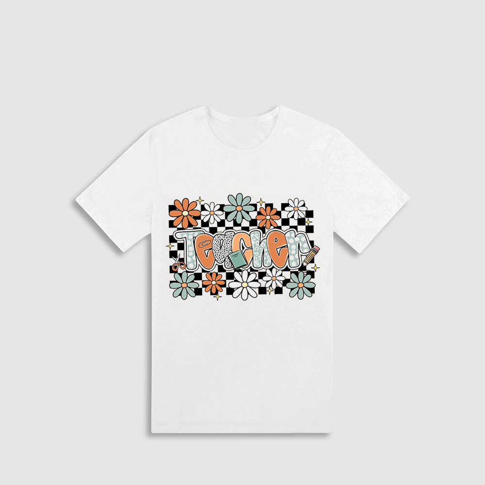 A white t-shirt with a graphic design featuring a floral pattern and the word "Toxo" written in a stylized font.