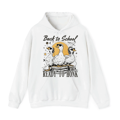 A white hoodie with a graphic design featuring three cartoon ducks and the text "Back to School READY to Honk" printed on it.