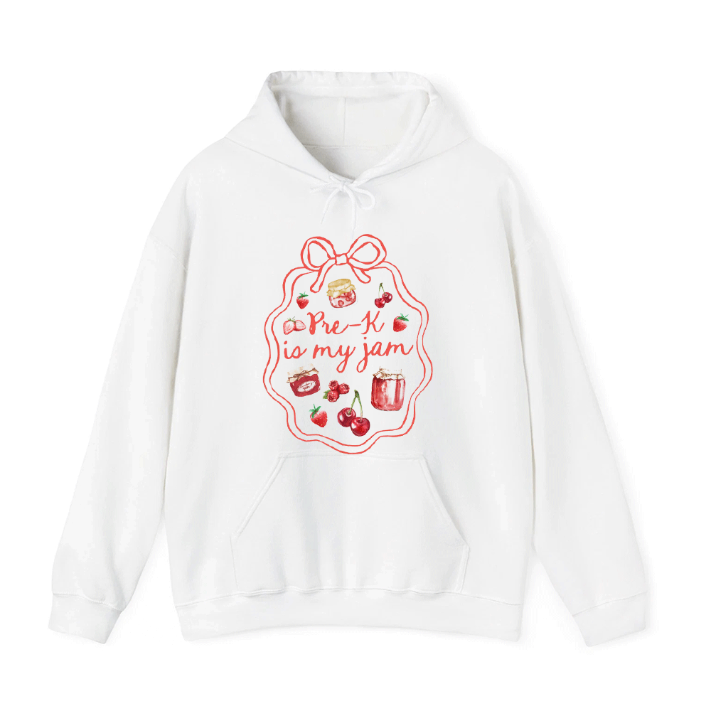 A white hoodie with a graphic design featuring a red ribbon and various food items, along with the text "Pre-K is my jam!"