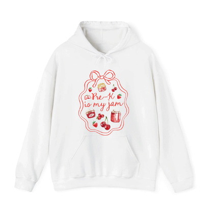 A white hoodie with a graphic design featuring a red ribbon and various food items, along with the text "Pre-K is my jam!"