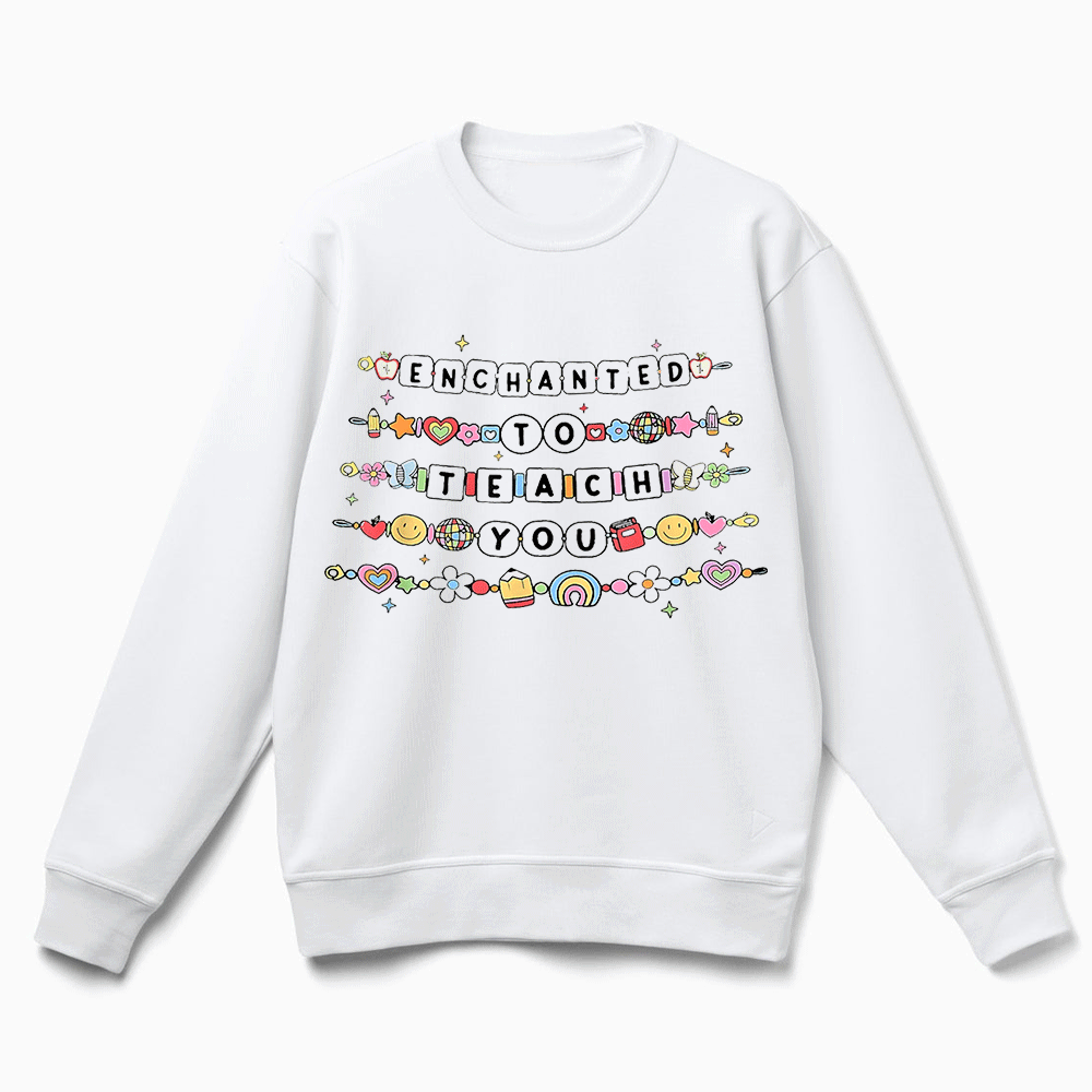 A white sweatshirt with a colorful graphic design featuring text and various icons.