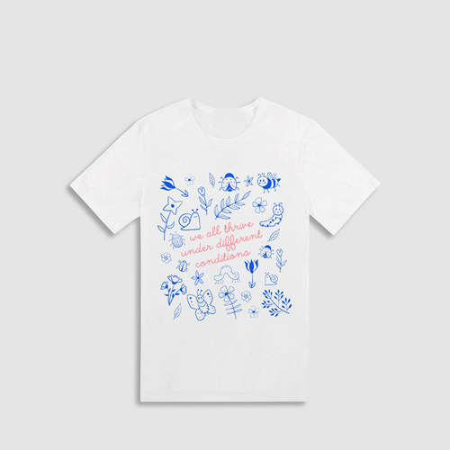 A white t-shirt with a printed design featuring various blue and white illustrations, along with the text "we all thrive under different conditions" printed on it.