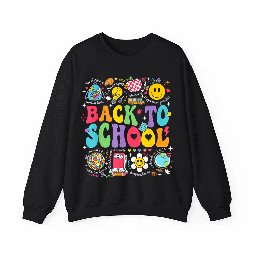 A black sweatshirt with a colorful graphic design featuring various school-related icons and text, including a smiley face, globe, book, and other school-related symbols.