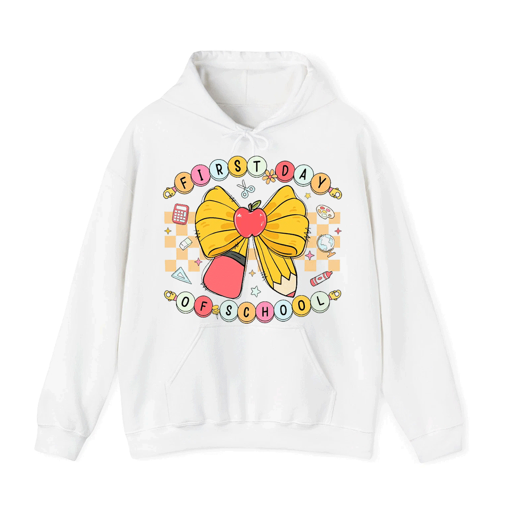 A white hoodie with a colorful graphic design featuring a yellow bow, an apple, and various school-related icons.
