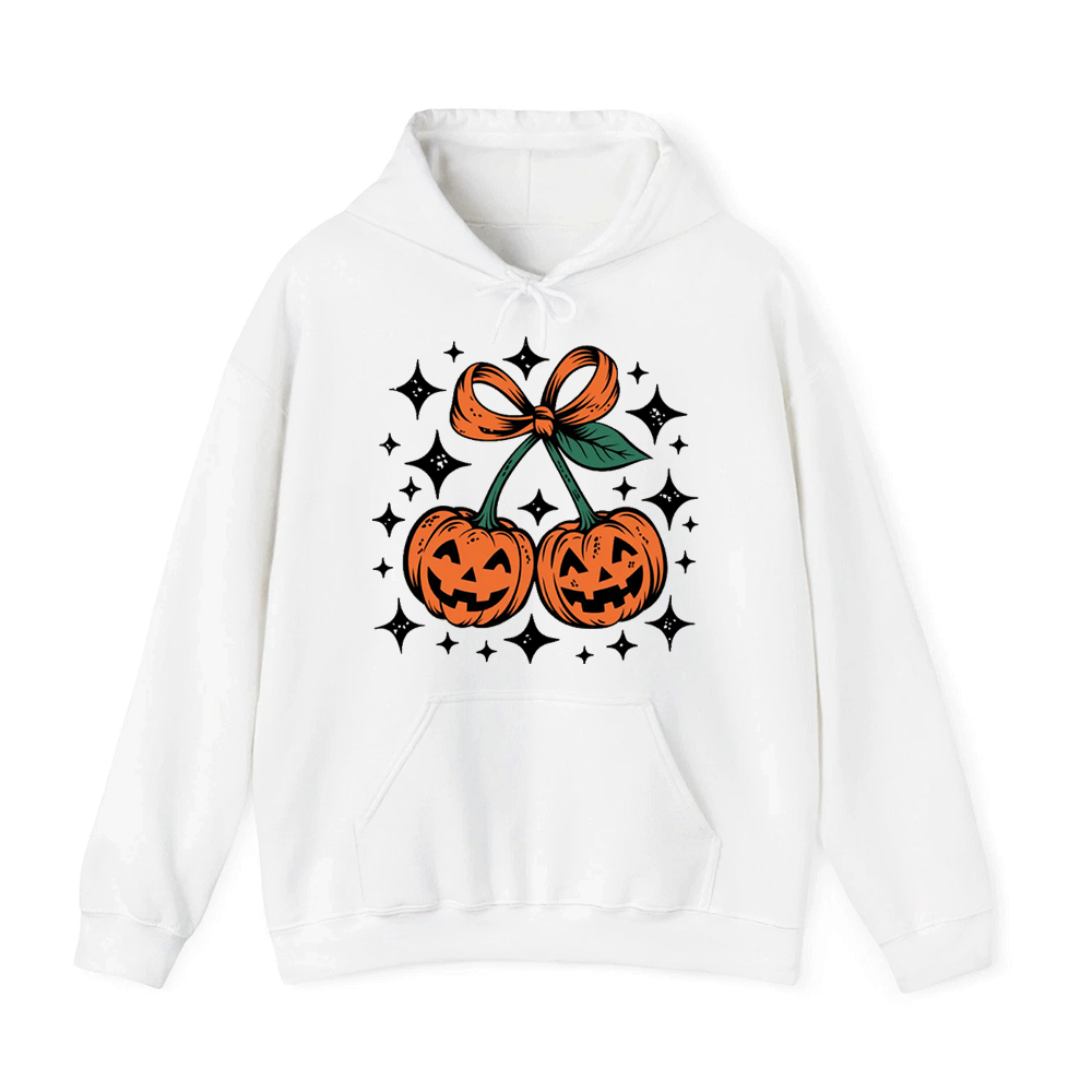 A white hoodie with a graphic design featuring two jack-o-lanterns and a bow.