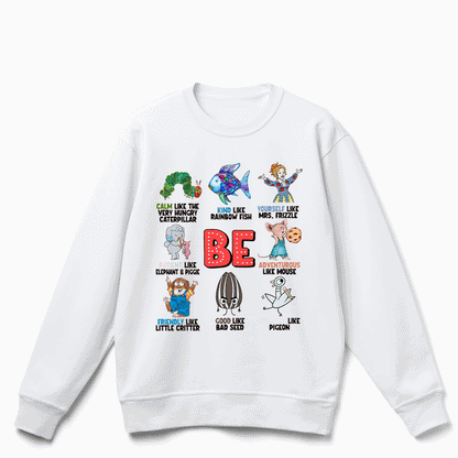 The image is a white sweatshirt with a graphic design featuring various cartoon characters and text.