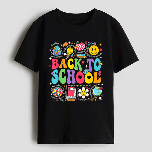 A black t-shirt with a colorful graphic design featuring various school-related icons and text, including a smiley face, globe, books, and other school-related symbols.