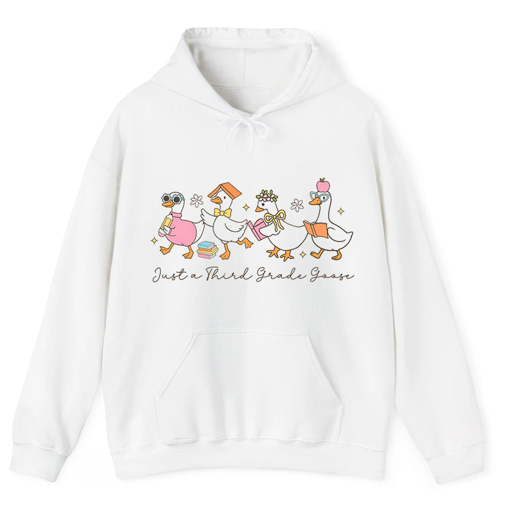 A white hoodie with a graphic design featuring cartoon ducks and the text "Just a Third Grade Goose" printed on it.