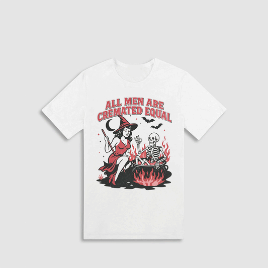 A white t-shirt with a graphic design depicting a witch and a skeleton in a cauldron, along with the text "All men are cremated equal".