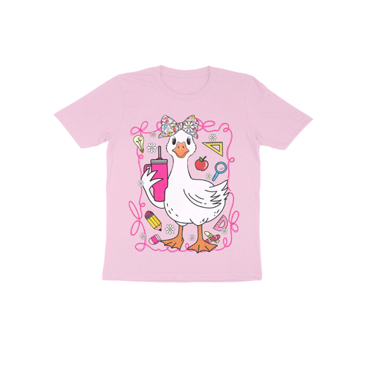 A pink t-shirt with a cartoon image of a duck holding a drink and surrounded by various school supplies.