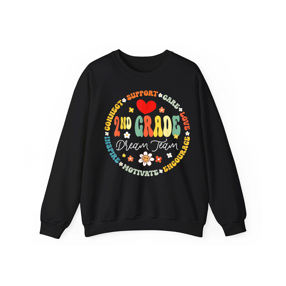 A black sweatshirt with a colorful circular design featuring the words "2nd Grade Dream Team" and various motivational phrases surrounding the design.