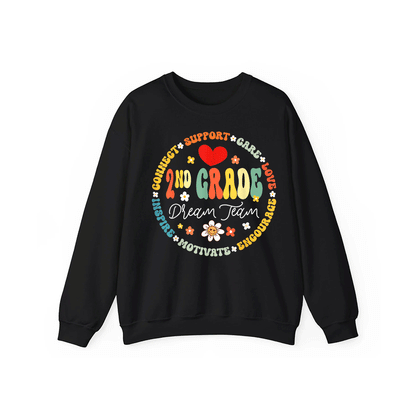 A black sweatshirt with a colorful circular design featuring the words "2nd Grade Dream Team" and various motivational phrases surrounding the design.
